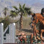 Hope Glynn and the chestnut horse Balios Z on the hunter course.