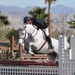 John Bragg and grey mount Riesling on course at the HITS Desert Horse Park.